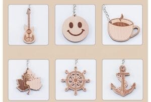 Personalised wooden keychain: Laser-engraved guitar, smiley face, coffee, leaf, ship wheel, and anchor designs.