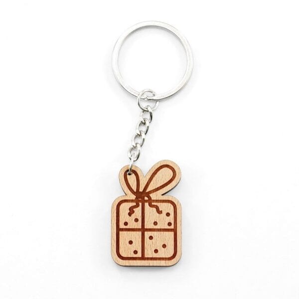 Personalised wooden keychain featuring a laser-engraved gift design with metal ring.