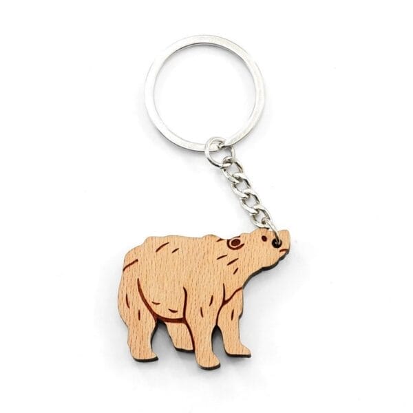 Personalised wooden keychain featuring a bear design with a metal ring and chain.