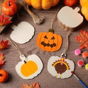 Wooden pumpkin cutouts: DIY Thanksgiving & Halloween decorations. Set of painted and blank pumpkin shapes for crafting.