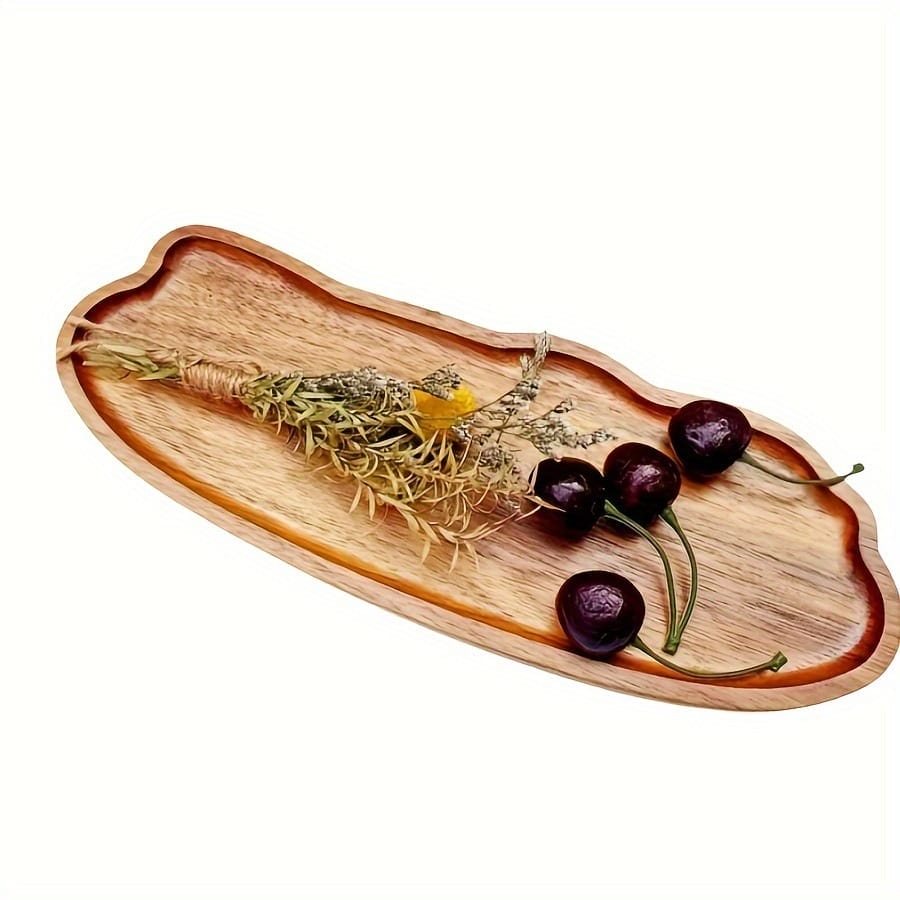 Acacia wood serving tray with cherries and dried flowers. Cloud shaped tray perfect for home decor.