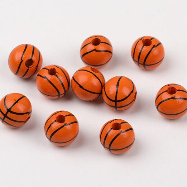 Orange basketball-themed wooden beads for DIY crafts.