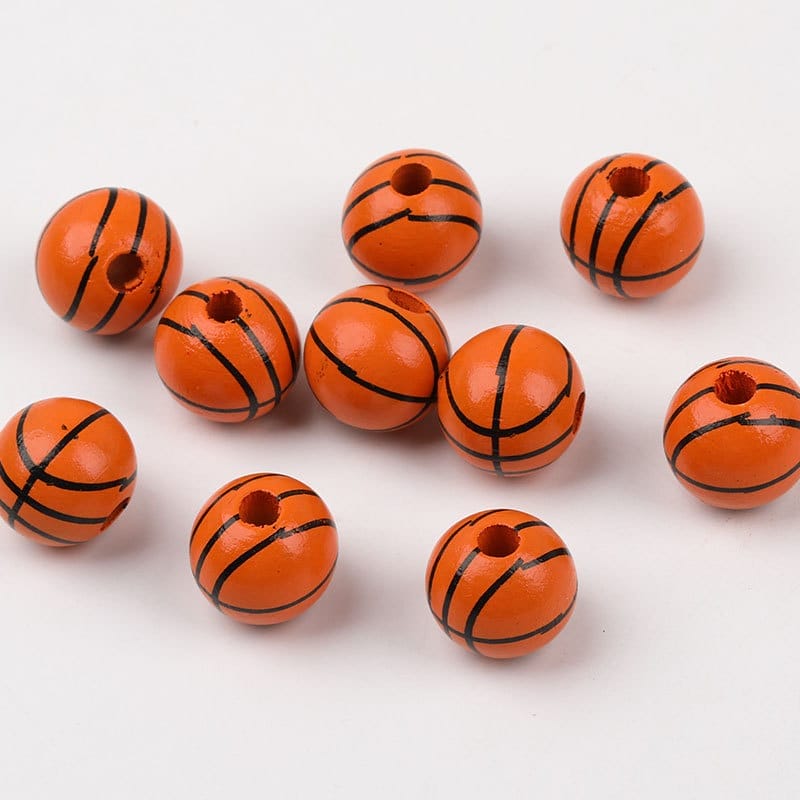 Orange basketball-themed wooden beads for DIY crafts.
