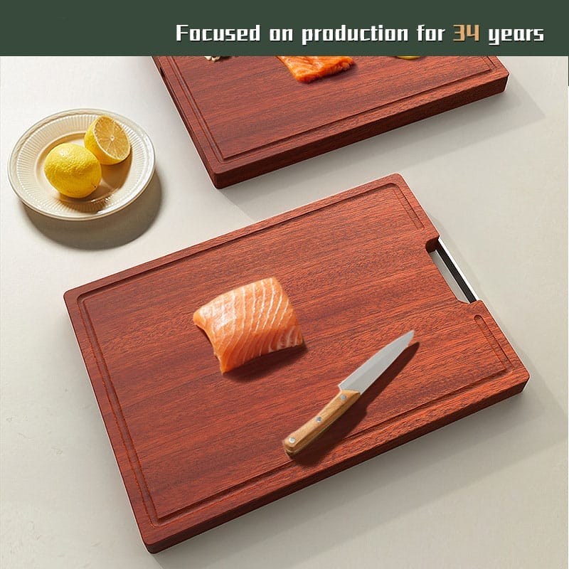 Two large cherry wood cutting boards, one with salmon and knife. Wholesale cherry wood boards available.