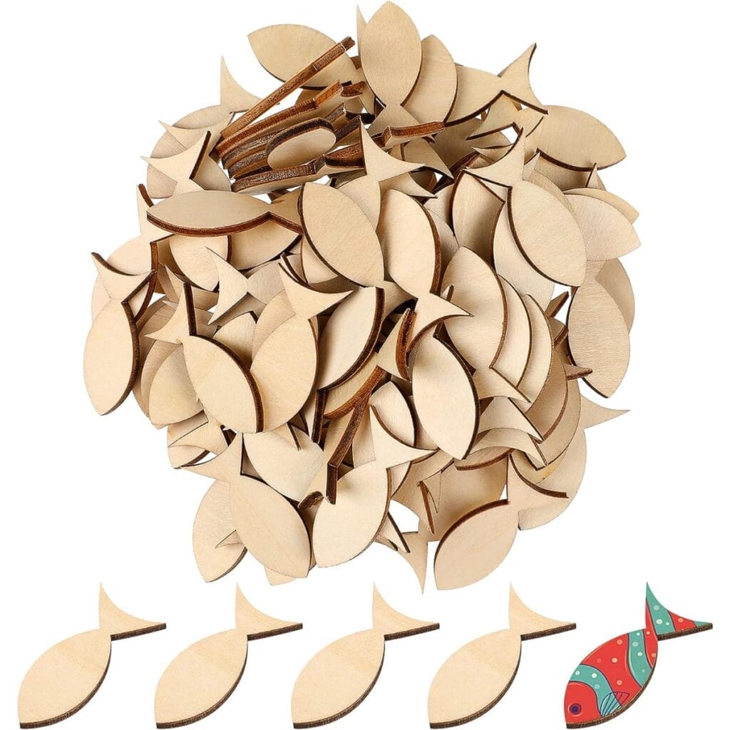 Pile of unfinished wooden fish shapes, ideal for craft projects and decorations. Custom cut wood pieces.