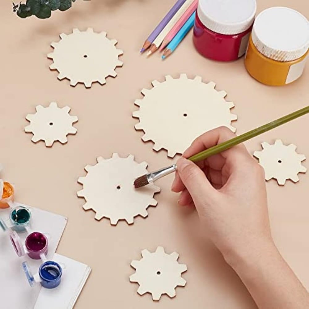 Hand-painted wooden gears, custom wood cutouts for decorative use.