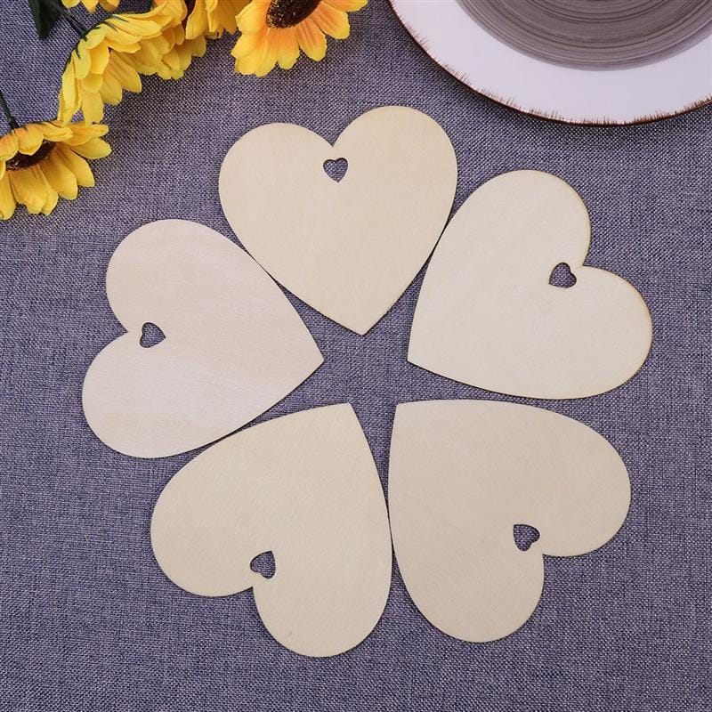 Five laser-cut wooden hearts, perfect for wholesale craft projects or custom decorations.