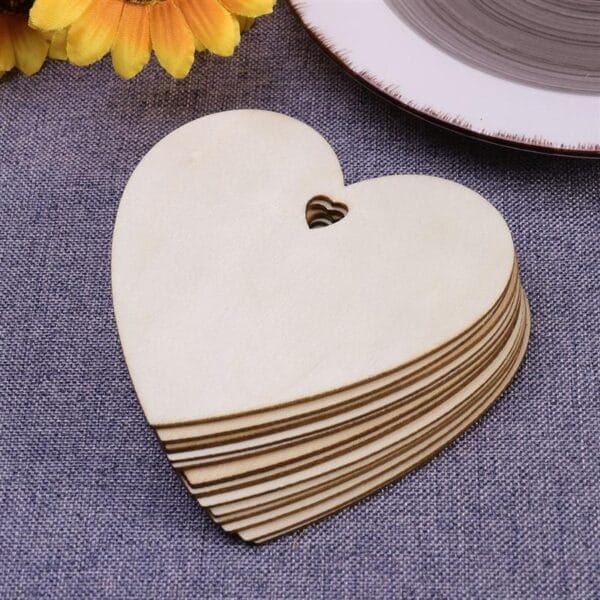 Stack of laser-cut wooden heart shapes; wholesale wood cutout decorations