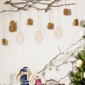 Custom wood cutouts: Wooden hanging ornaments, rustic Christmas decor with small gift boxes and lightbulb shapes