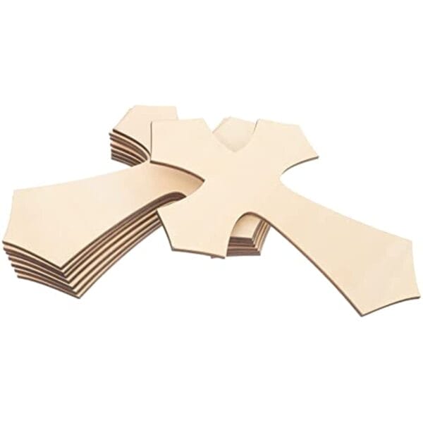 Stack of unfinished wooden crosses, perfect for DIY home decor projects. Custom wood shapes available.