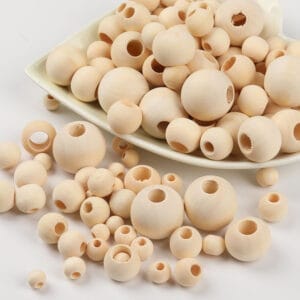 LWooden beads with large holes, ideal for crafting. Wholesale wood color polygon beads.
