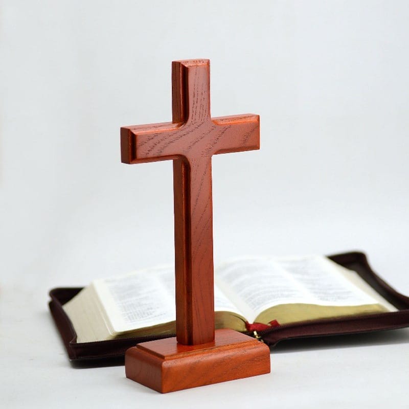 Large wooden cross on a Bible. Wholesale wood cross decor.