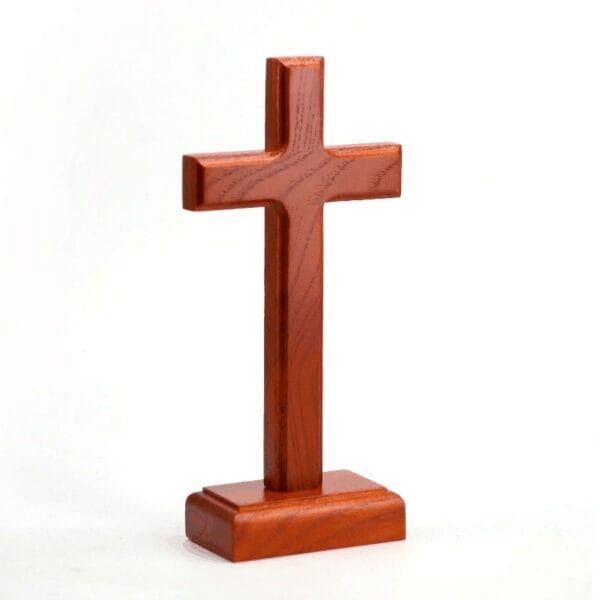 Large, freestanding wooden cross on a base. Wholesale wood cross decor.