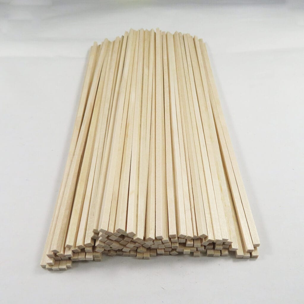 Long wooden stick for model building. Bulk pack of long, square balsa wood sticks.