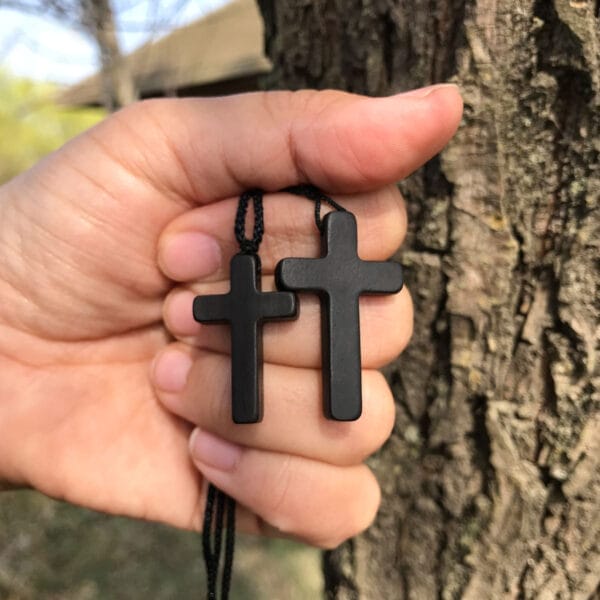 Men's wooden cross necklace, black, two sizes.