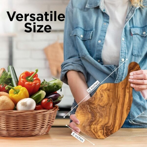 Woman holding large olive wood cutting board; eco-friendly, versatile size.