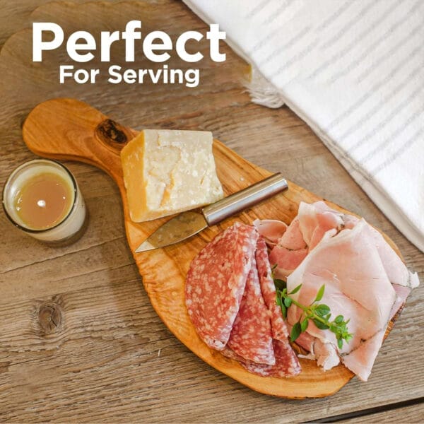 Olive wood serving board with salami, cheese, and knife. Perfect for serving appetizers.