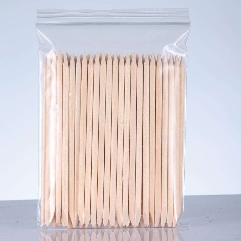 Bulk orange wood cuticle sticks for manicure and pedicure. Ideal nail care tools for professional or home use.