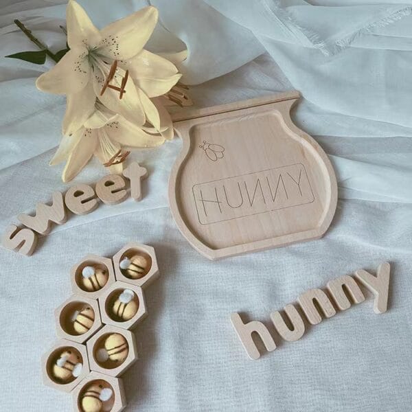 Wooden honey pot tray with bees and "Sweet Hunnny" lettering.