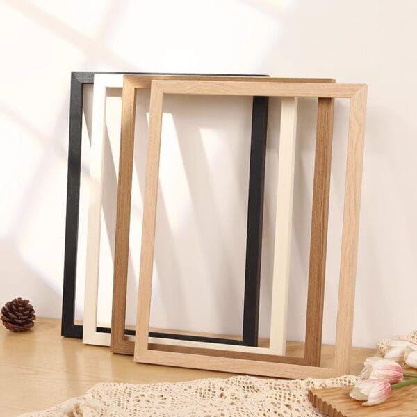 Three customizable solid wood picture frames in black, white, and natural wood. Wholesale vintage oil painting frames available.