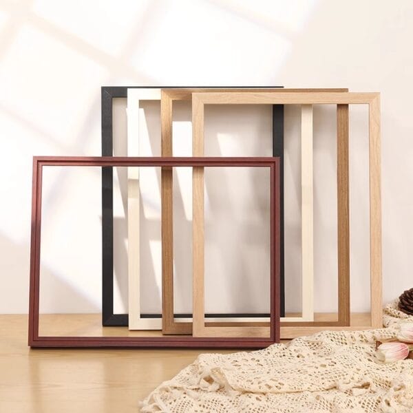 Assortment of customizable solid wood picture frames in various colors and sizes. Wholesale options available.