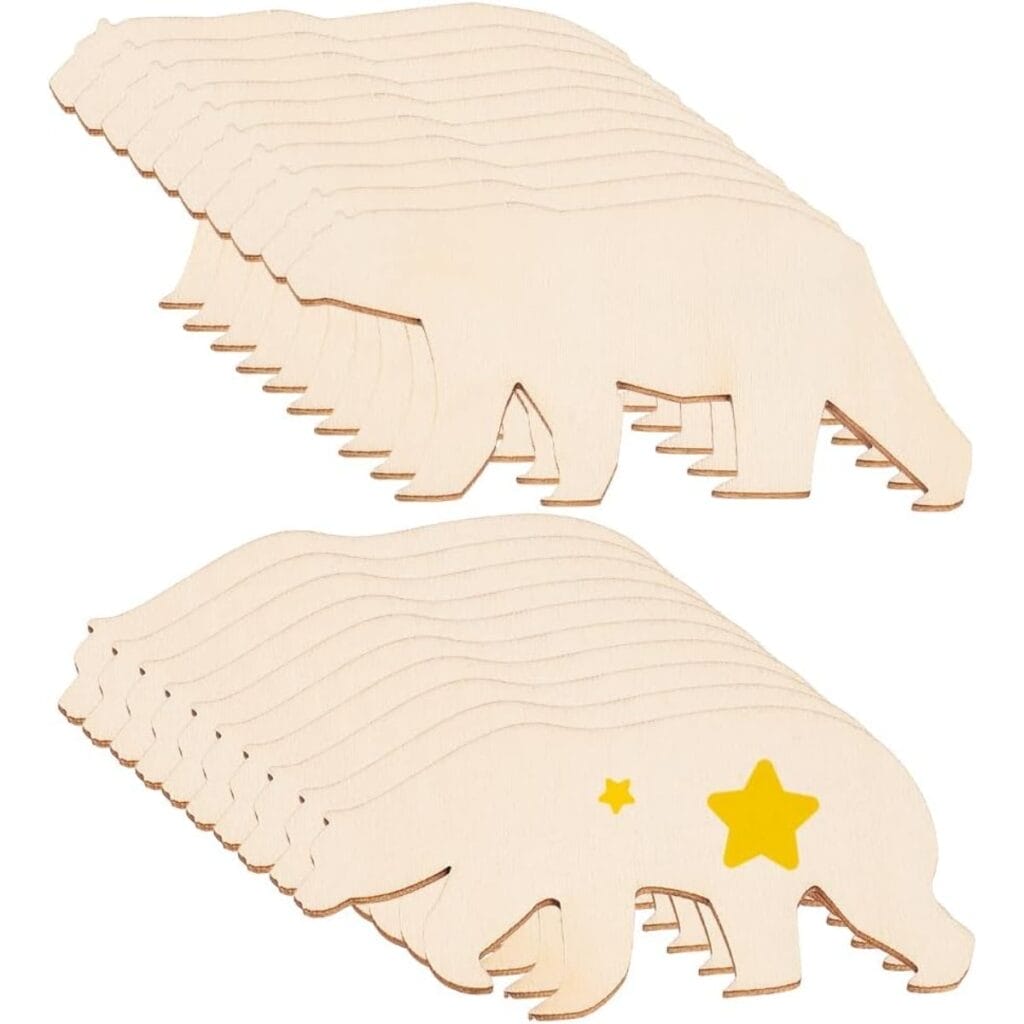 Stack of unfinished wood crafts polar bear shapes; wholesale wooden pendants