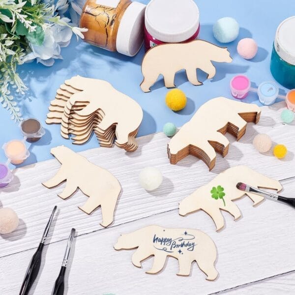 Unfinished wooden bear shapes for craft projects. Wholesale wooden pendants available.
