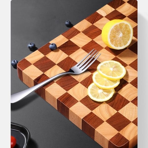 Checkered walnut cutting board with lemons and fork. Wholesale kitchen boards.