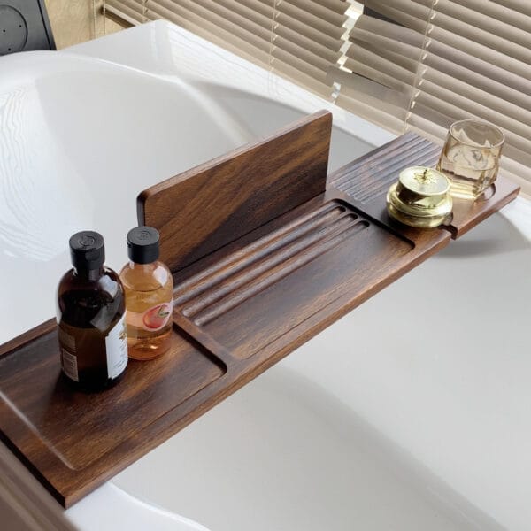 Dark wood bath tray caddy with bottles and glass. Wholesale wood bath tray for spas.