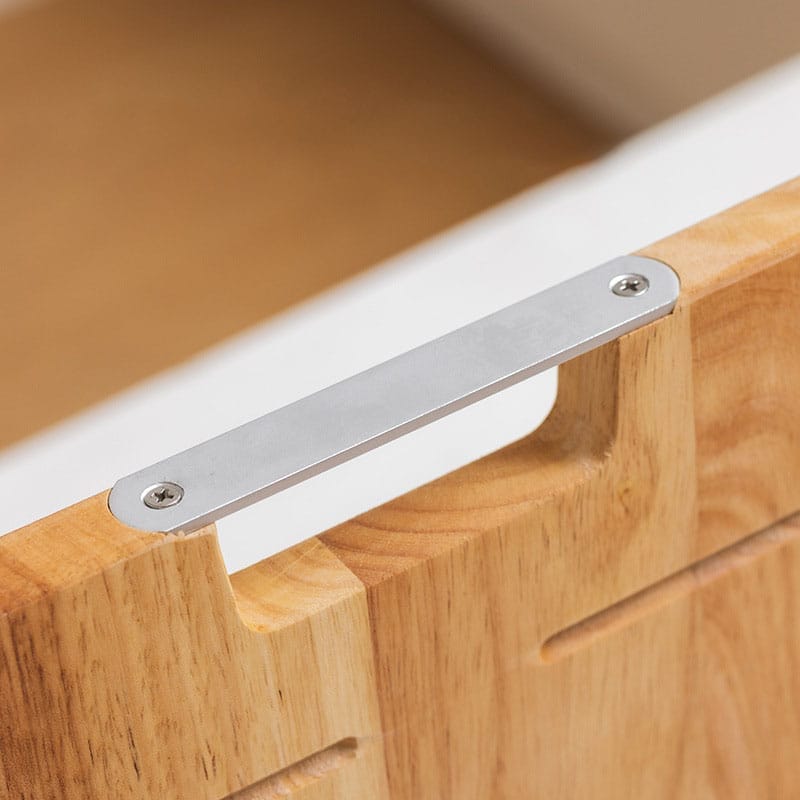 Close-up of a wooden cutting board with a sleek silver handle. Eco-friendly design.