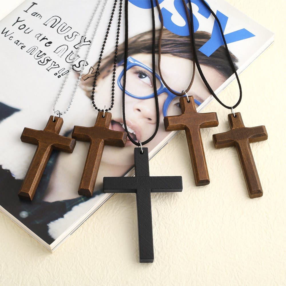 Wooden Cross Necklaces: Set of five stylish cross pendants; three dark brown wood, two lighter brown, one black. Religious jewelry.