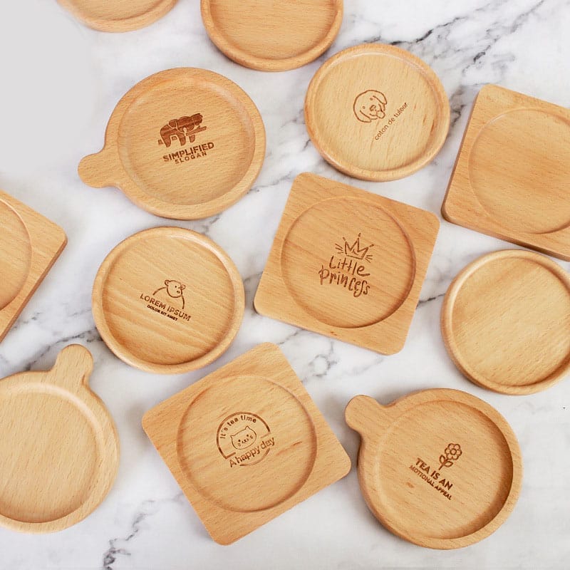 Custom Logo Engraved Wood Drink Coasters: Set of assorted round and square wooden coasters, personalized with various designs and logos. Perfect for wholesale and distribution.