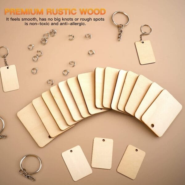 Wholesale blank rectangle wooden keychains: Unfinished light wood, perfect for DIY crafts. Includes keyrings.