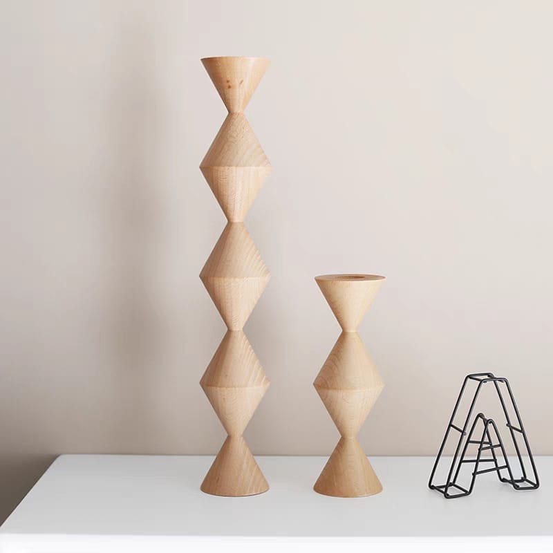 Two modern, eco-friendly Nordic style wood pillar candle holders. Custom wood pillar candle holder design.