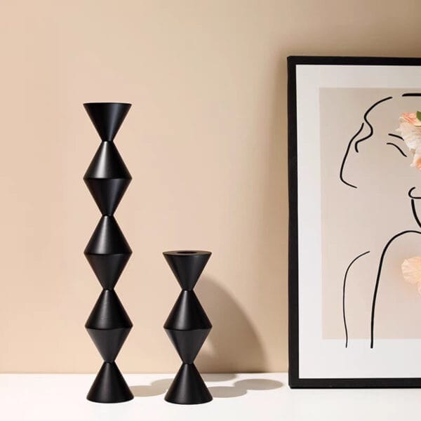 Black geometric wood candle holders, Nordic style. Eco-friendly design.