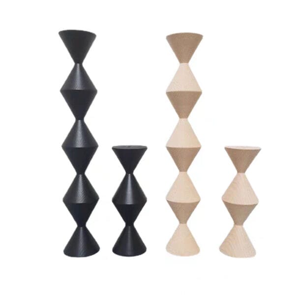 Set of three Nordic-style wooden candle holders, in black and natural wood. Eco-friendly custom design.