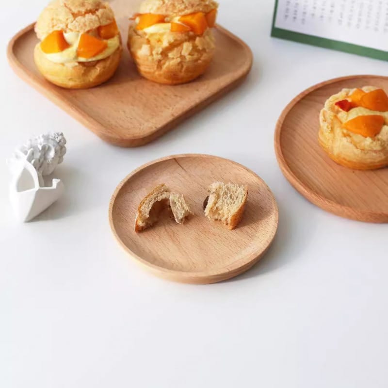 Beech wood oval cake trays: Set of elegant wooden platters perfect for serving cakes, pastries, or other desserts. Wholesale available.