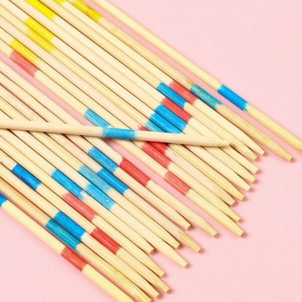 Colorful wooden pick-up sticks game. Wholesale supplier of wooden game sticks for distributors.