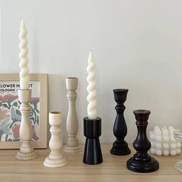 Set of elegant wooden candle holders with taper candles. Wholesale supplier of wood candle holders.
