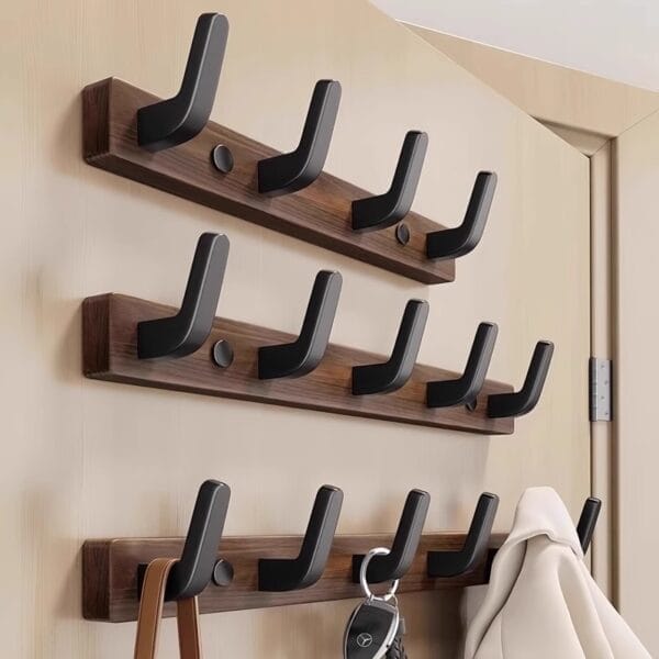 Modern walnut wood wall hangers mounted coat rack with multiple black hooks, ideal for entryway or hallway.