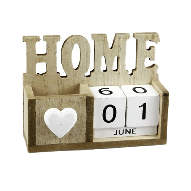 Wooden advent calendar with doors showing June 1st. Features a small heart and the word "HOME".