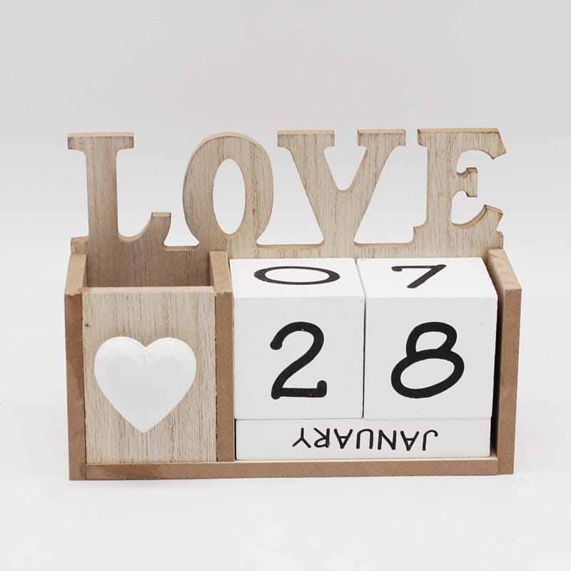 Wooden LOVE calendar with January 28 displayed. Features a small heart and cubby.