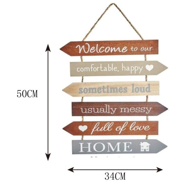 Wooden arrow sign: Welcome to our comfortable, happy, sometimes loud, usually messy, full of love HOME.