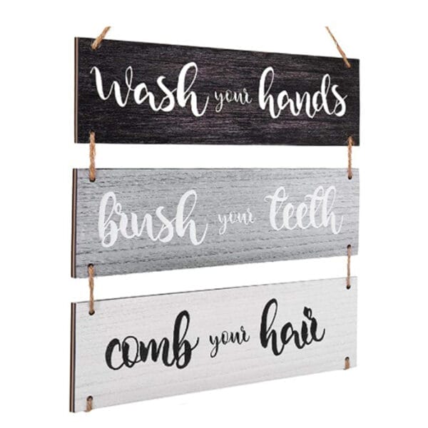 Three rustic wooden signs hang, reading "Wash your hands," "Brush your teeth," and "Comb your hair." Custom hanging decorations from a wooden arrow sign manufacturer.