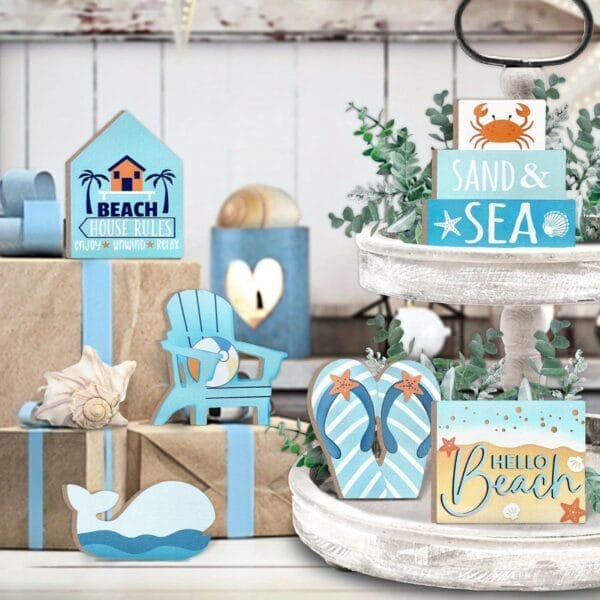 Wooden beach signs house signs, flip-flops, whale, and crab decorations. Perfect for cabin themes.