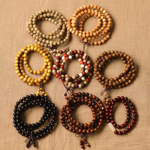 Assortment of wholesale wooden bead necklace. Various colors and styles available for distributors and retailers.