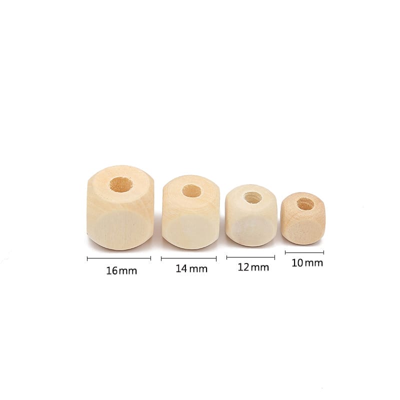 Four wooden polygon beads of varying sizes, showing wholesale wood beads with large holes.