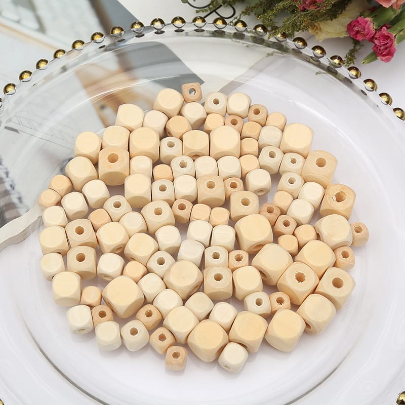 Wooden cube beads in natural color; wholesale wood beads with large holes, ideal for crafting.