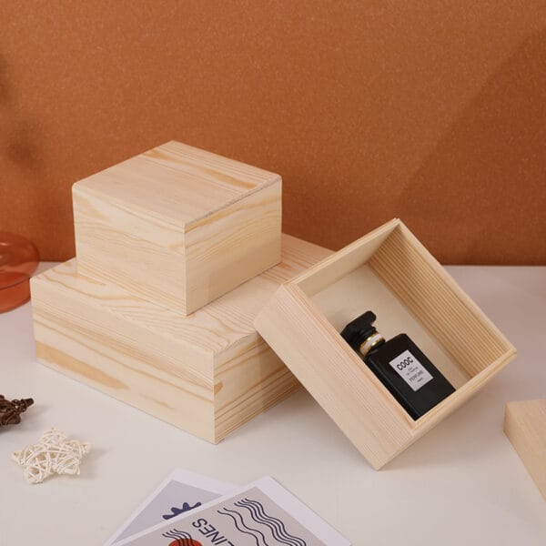 Custom Wooden Keepsake Boxes: Set of three unfinished pine wood boxes, perfect for storage, gifts, or crafts. One box shows a lift-off lid.