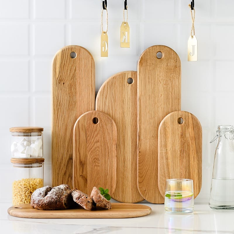Set of wooden bread boards, ideal for bread and steak, from a cutting board supplier.